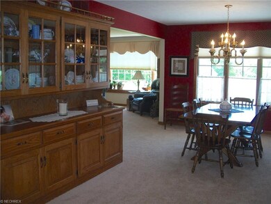 The dining room features a built in china cabinet