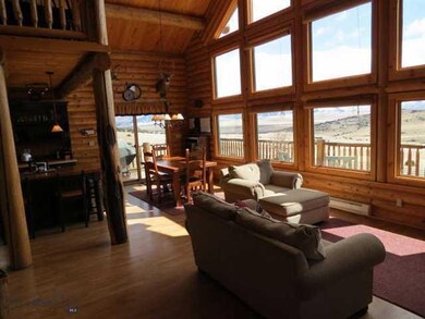 The living area as well as the large wrap around d