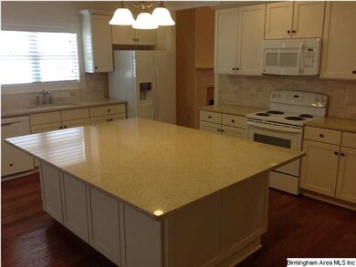 Quartz countertops!  Just look at that size of tha