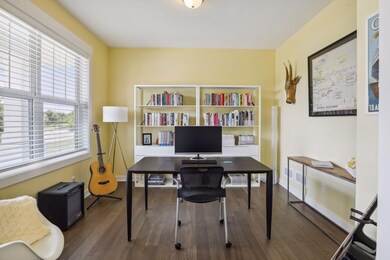 The main level office/flex room is found off the front entryway.