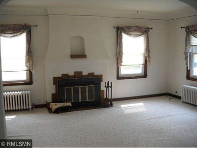 Living room with wood burning fireplace