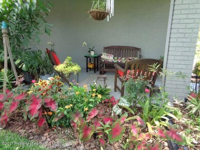 Porch overlooks garden