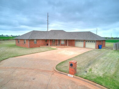 Ranch-style home with a garage and a front yard