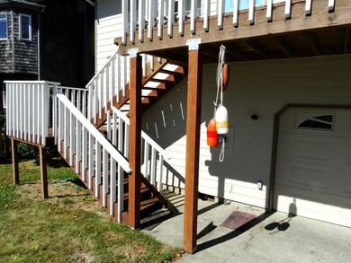 Staircase to deck and front entry