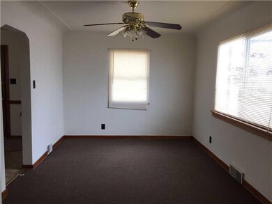 Dining Room. Large bright dining room, ceiling fan