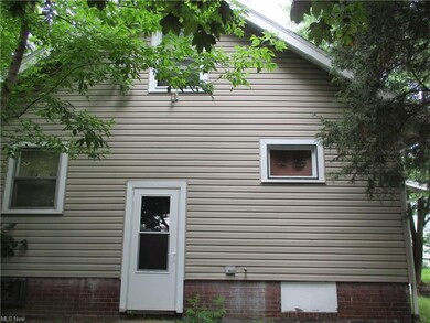 Back entry door as seen from the alley. Niles Plac