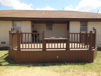 Covered and open rear deck