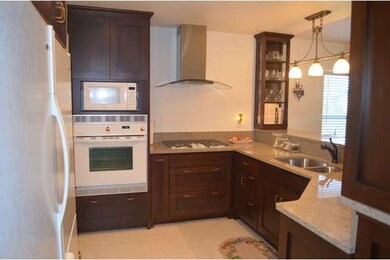 Kitchen with 2 Side by Side Refrigerators