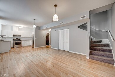 Living Room with Combo Dining Area, Kitchen and St