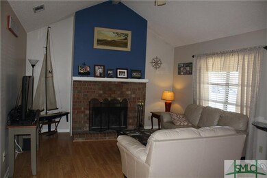 Family Room w/wood burning fireplace