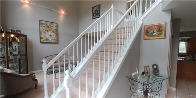 Two story foyer makes an impressive statement.