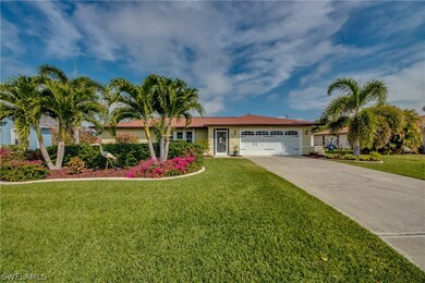 Beautiful home inside and out at 805 SE 34th Ter Cape Coral. Garage 'windows' are decorative.