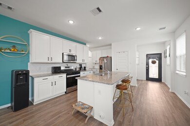 Step into the kitchen, where granite countertops m