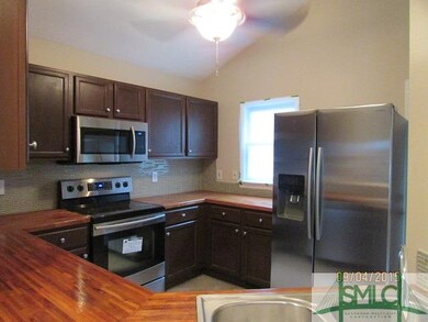 Kitchen has brand new stainless steel appliances, 