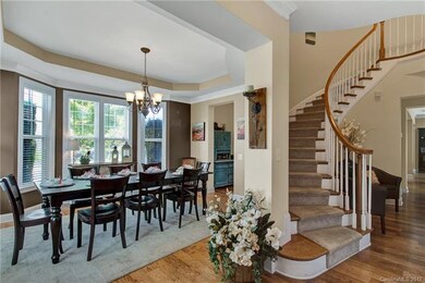 As you enter the home, you are greeted by a statel