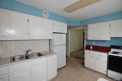 KITCHEN - STOVE AND REFRIGERATOR INCLUDED