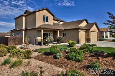 Low Maintenance, Manicured Landscaping In Front Ya