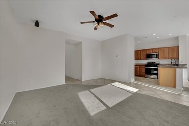 Unfurnished living room with light carpet, a ceili