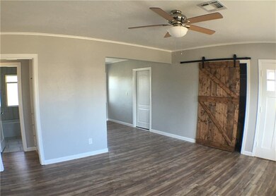 View of living area and barn door
