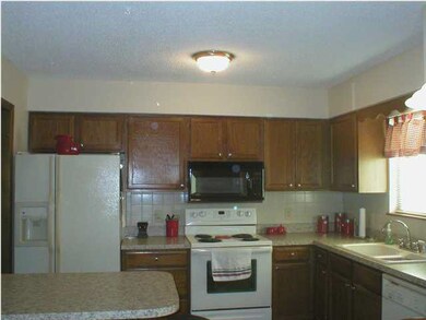 Fully Applianced Kitchen. Newer oven featuring bre