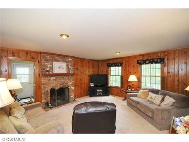 Den/Family/Great Room - Brick fireplace and pine a