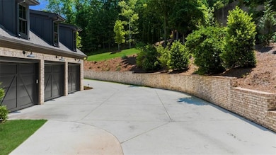 View of patio / terrace with a garage