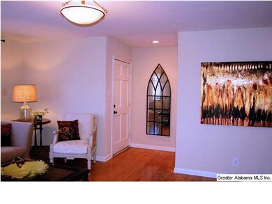 As you step into the foyer, you will see that it h