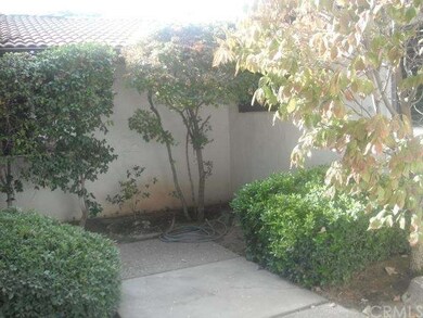Inside courtyard to front door.