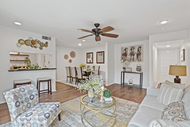This living room conveniently connects to the dini