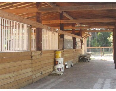 Stable/Barn. Pole Barn/Stable with 4 run in stalls
