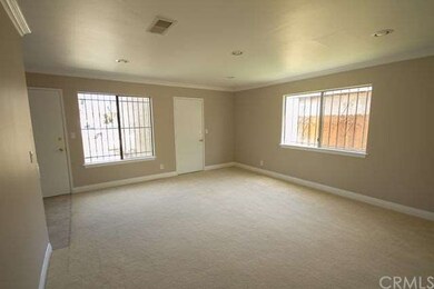 Living room with tiled entry
