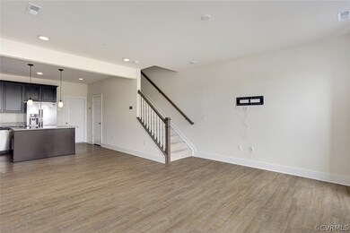 Unfurnished living room with wood-type flooring