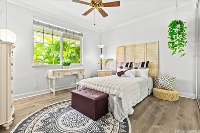 Charming second bedroom with serene garden views,