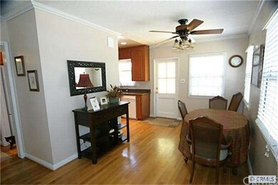 Large Dining Area With Oak Hardwood Floors