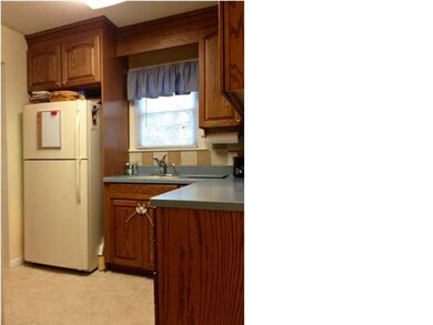 View of Kitchen coming in from Garage - Look at th