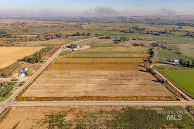 View of property location with rural landscape and extensive farmland