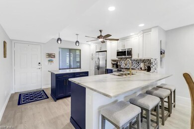 5792 Deauville Cir unit 103, Naples, FL 34112 - photo 2