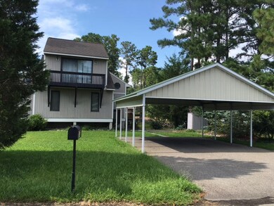 348 BALD CYPRESS DR EXT & CARPORT