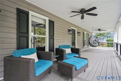 Wooden porch with a ceiling fan