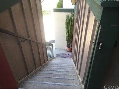 Stairwell to the single story unit.