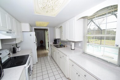 GORGEOUS KITCHEN OVERLOOKING POOL!