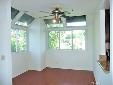 Dining rom with ceiling fan and 2 windows