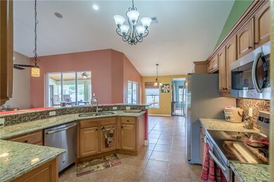 Kitchen has been recently updated with granite cou