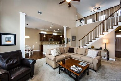 Two story Great Room open to Kitchen and Eating Ar