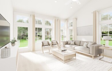 Sunroom featuring vaulted ceiling and ceiling fan