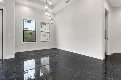 Empty room with dark marble finish flooring and re