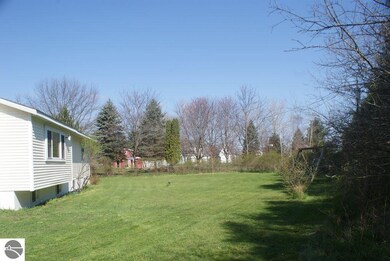Rear view of the home and back yard.