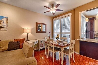 Dining room with ceiling fan and access to back ya