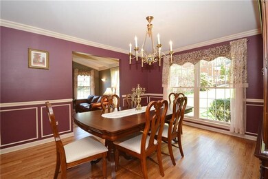 Large dining room with large windows and nice trim