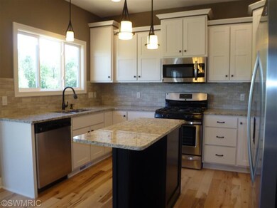 2147 Center Grange Dr, Byron Center, MI 49315 - photo 2